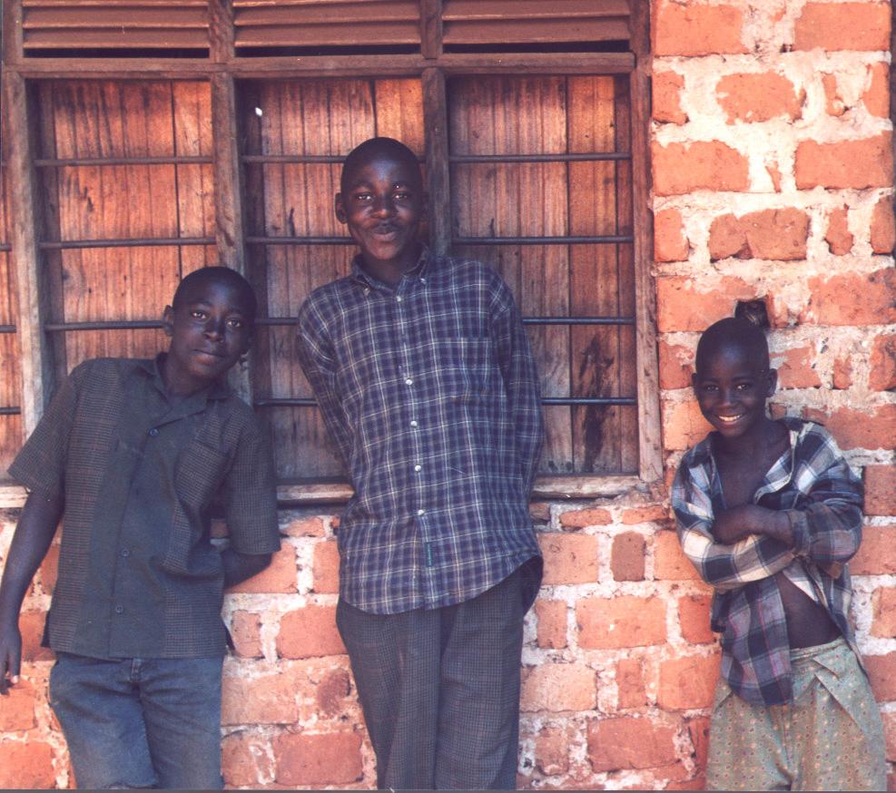 3 males smiling